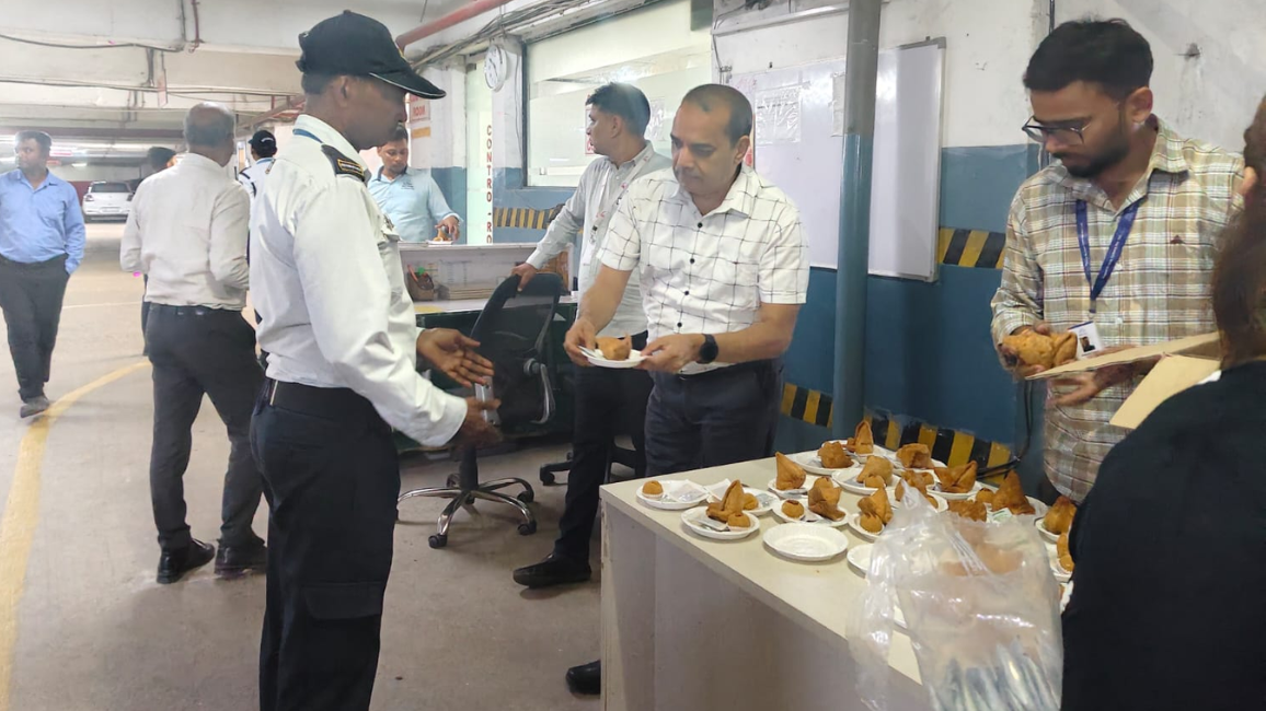 Snacks Distribution Drive for JMD Megapolis Staff